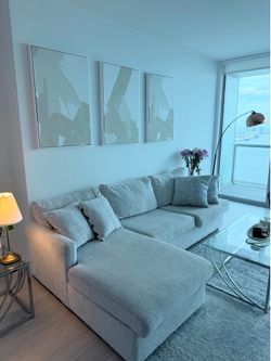 Sofa sectional cum bed , light grey, like new