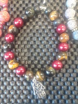 Custom made charm beaded bracelets with syones