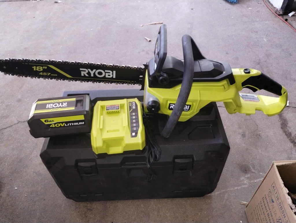 Like-New Ryobi 40v hp brushless 18 inch cordless battery powered chainsaw kit 6.0 ah battery & rapid charger included