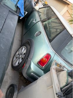Mini cooper for parts $500.00 it can be fixed I want my space