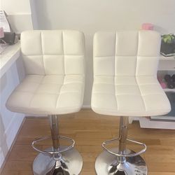 ** Two Cream Leather Look Silver Bar Stools **