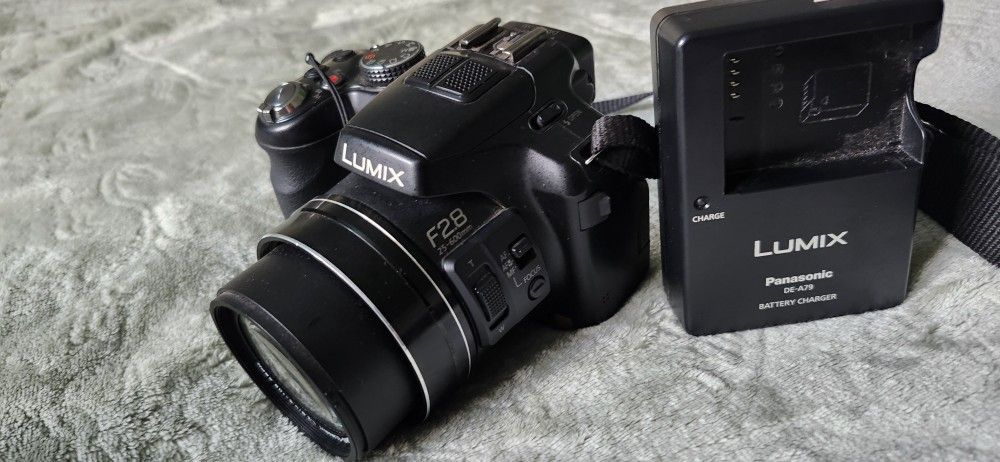 Lumix F-28 25-600 Great Camara 135