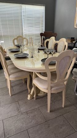 Used  formal dinning room table and chairs