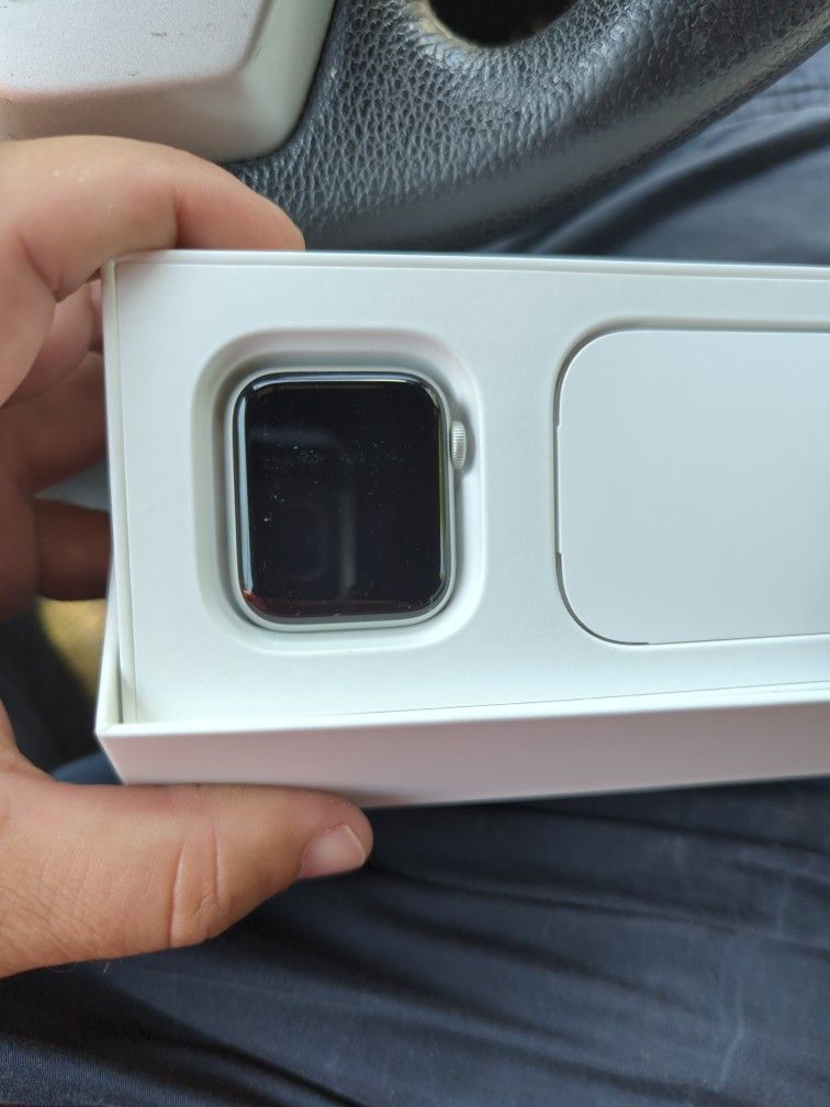 Apple Watch, iPhone, And MacBook Pro