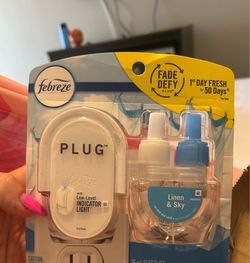 Febreze plug-in with three extra refills