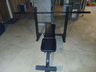 Fitness gear olympic bench with 7ft cap olympic bar and the pair of 45s  plates