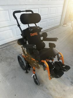 MANNING ZIPPIE IRIS CHILD TILT PEDIATRIC WHELLCHAIR BLACK AND ORANGE