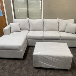 Light Grey Sectional Couch And Ottoman 