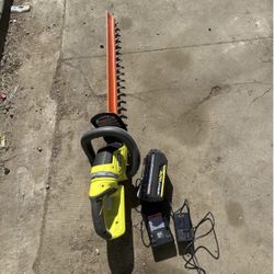 RYOBI 40V HP Brushless 26 in. Cordless Battery Hedge Trimmer with 4.0 Ah Battery and Charger