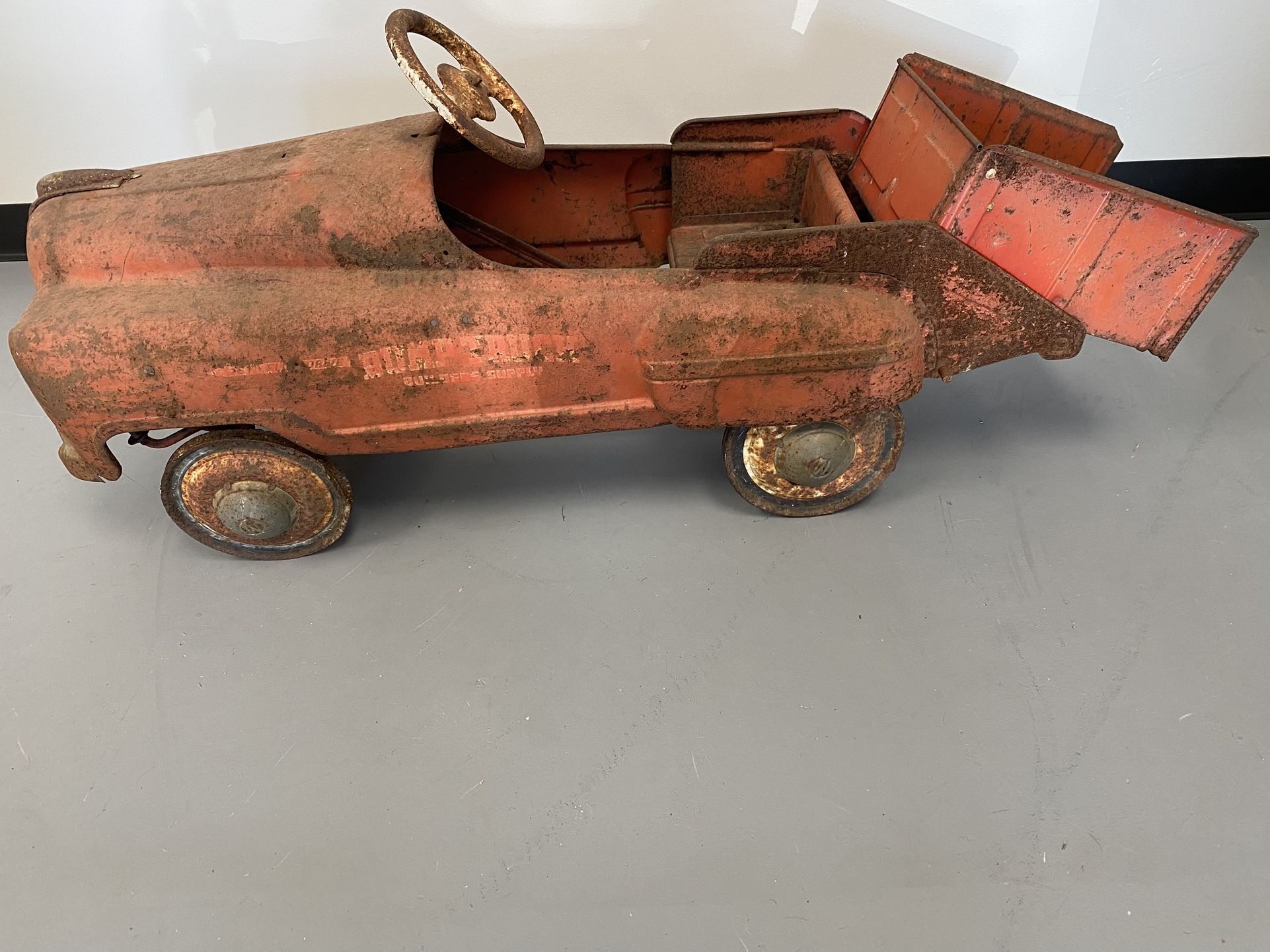 1950’s sad face pedal car dump truck