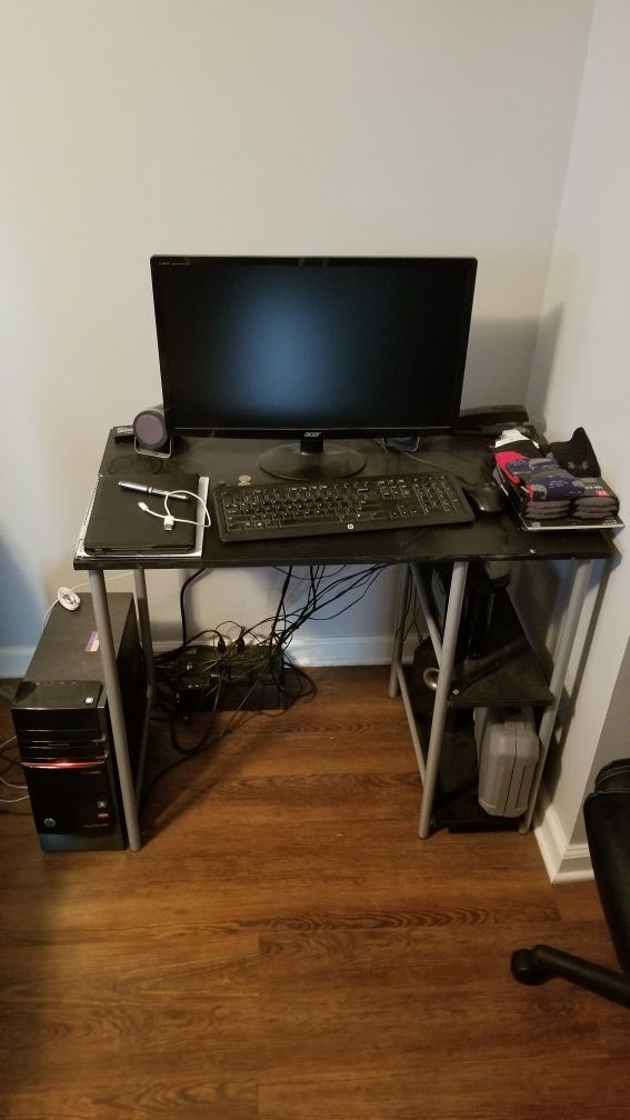 HP Desktop Computer/mouse/keyboard, 23" monitor, and computer desk