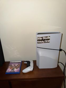 PS5 with dragon age and controller