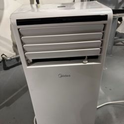 Airconditioner. Standing W/ Window Vent- Midea