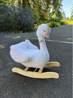 Kids ride on rocking swan