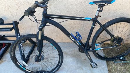 black and blue Marin Bobcat Trail mountain bike
