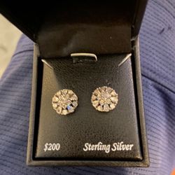 Diamond Flower Burst Stud Earrings (1/10 ct. t.w.)  in Sterling Silver