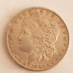 1891 silver dollar, $475