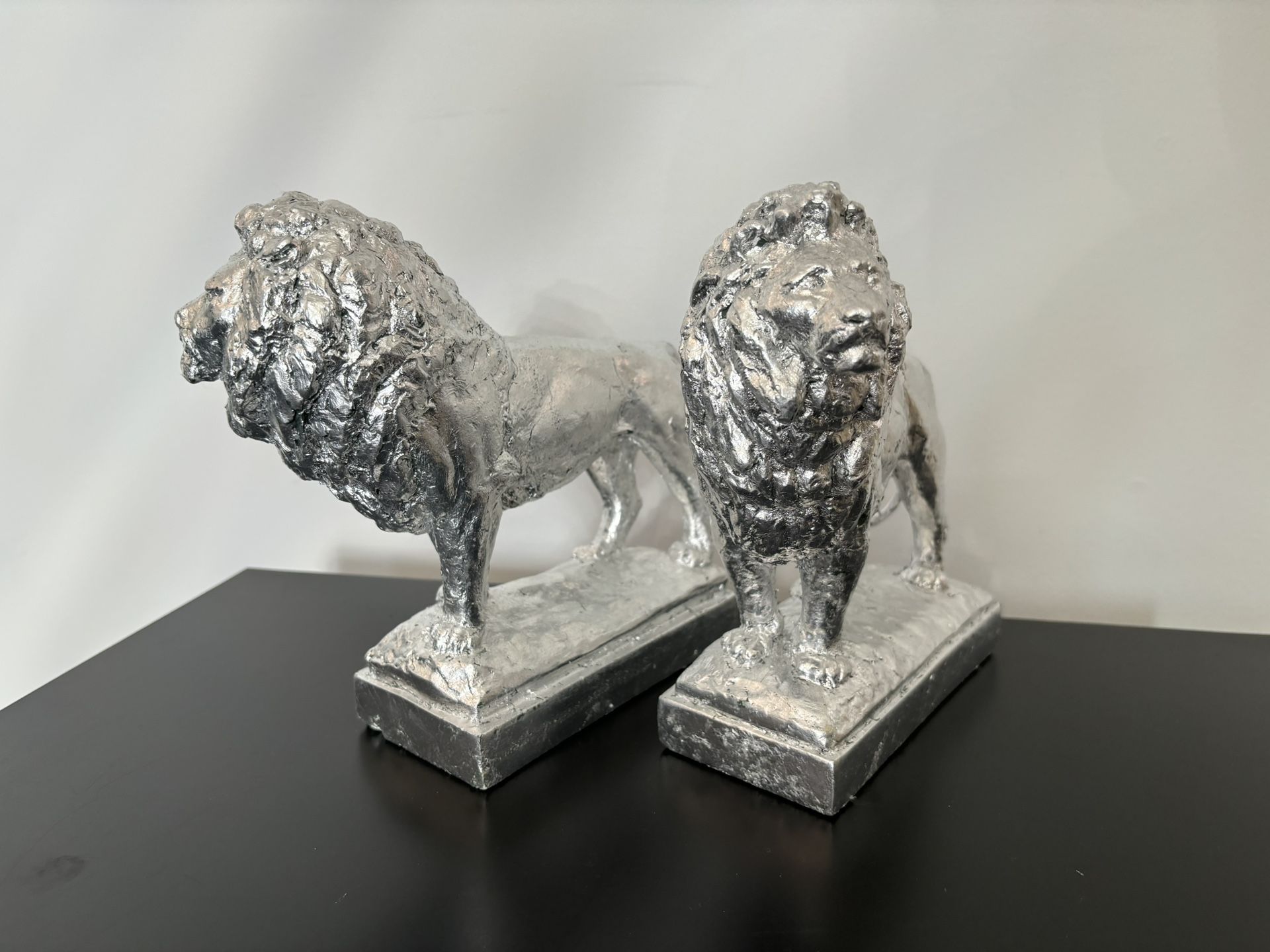 Pair of Silver-Leaf Covered Plaster Lion Bookends