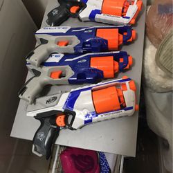 FOUR ELITE NERF GUNS WITH 400 DARTS