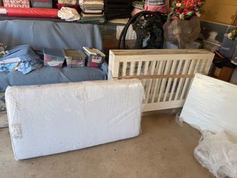 Solid wood infant crib only used twice