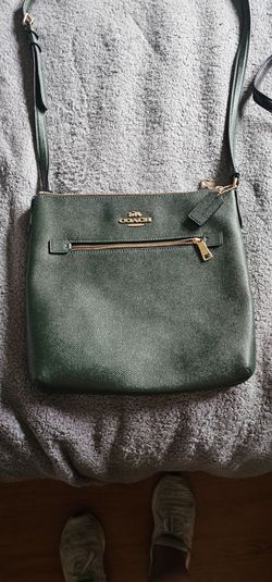Coach Rowan File Bag, style C1556, made of crossgrain leather. The C1556 is listed with an original MSRP around $250–$298