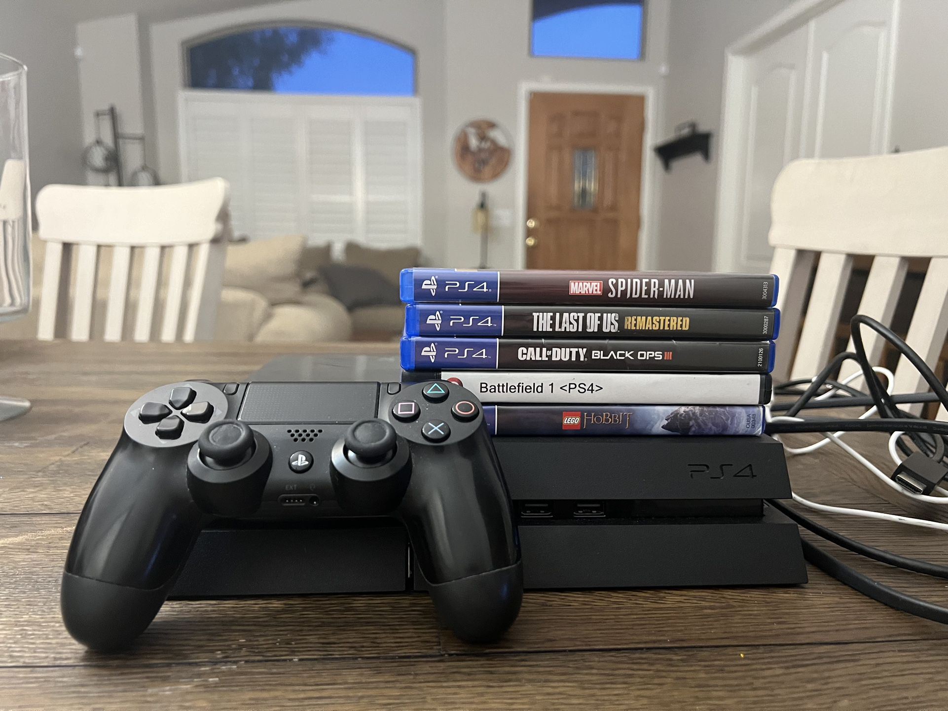 PS4 With Controller And Games