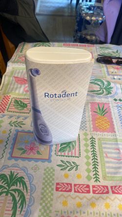 Rotadent contour toothbrush