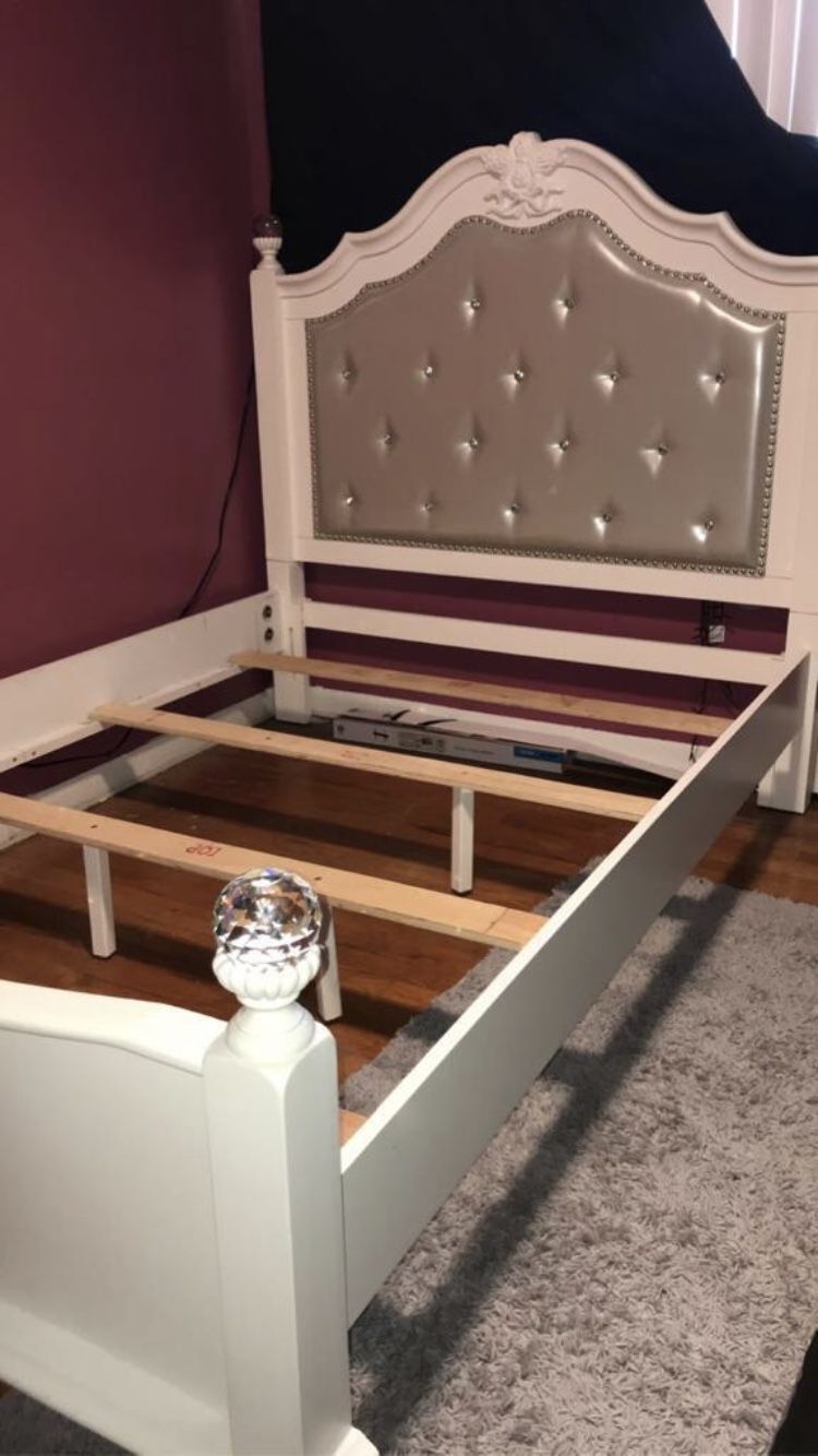 Full sized white bedroom set, bed frame and dresser/mirror