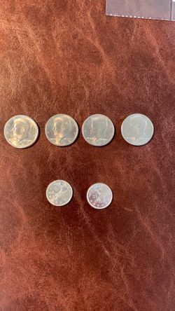 1970’s -D Kennedy half dollar coins & two 1968 Canadian quarters