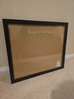 Black frame w/ clear plastic overlay
