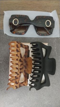 Sunglasses and 2 hair clips