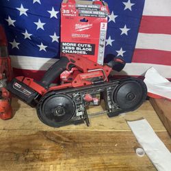 milwaukee  model #2829-20 compact bandsaw WITH new 5.0ah m-18 battery & new 3 pack of blades.
