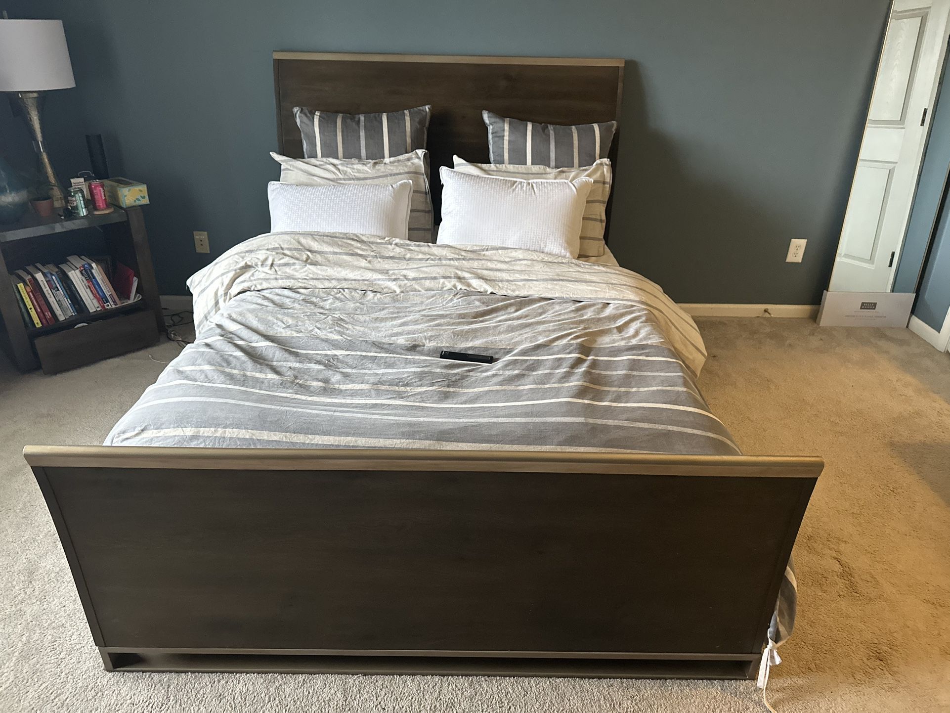 Full solid wood Queen bed set from Kensington Furniture. Originally 3,500. Fair condition.