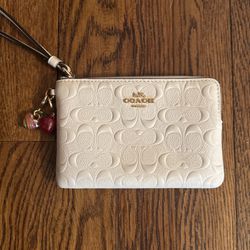 Off-white Coach Wristlet With Coach Charms
