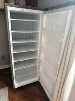 LG Upright freezer 4.3 qf(50”length , 21” width )