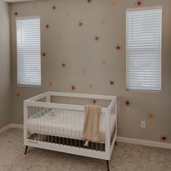 Delta Children Sloane 4-in-1 Acrylic Convertible Crib & Newton Mattress