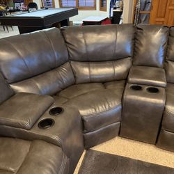 Leather Reclining Sectional.   9 Piece