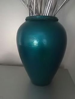 Metallic blue painted clay vase