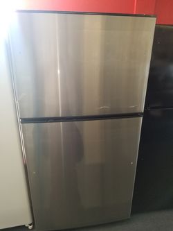 New scratch and dent GE 21cu.ft top mount fridge stainless steel 1 year warranty