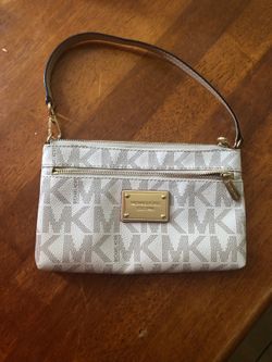 Michael Kors large wristlet $45.00 FIRM NO LOW OFFERS!!!