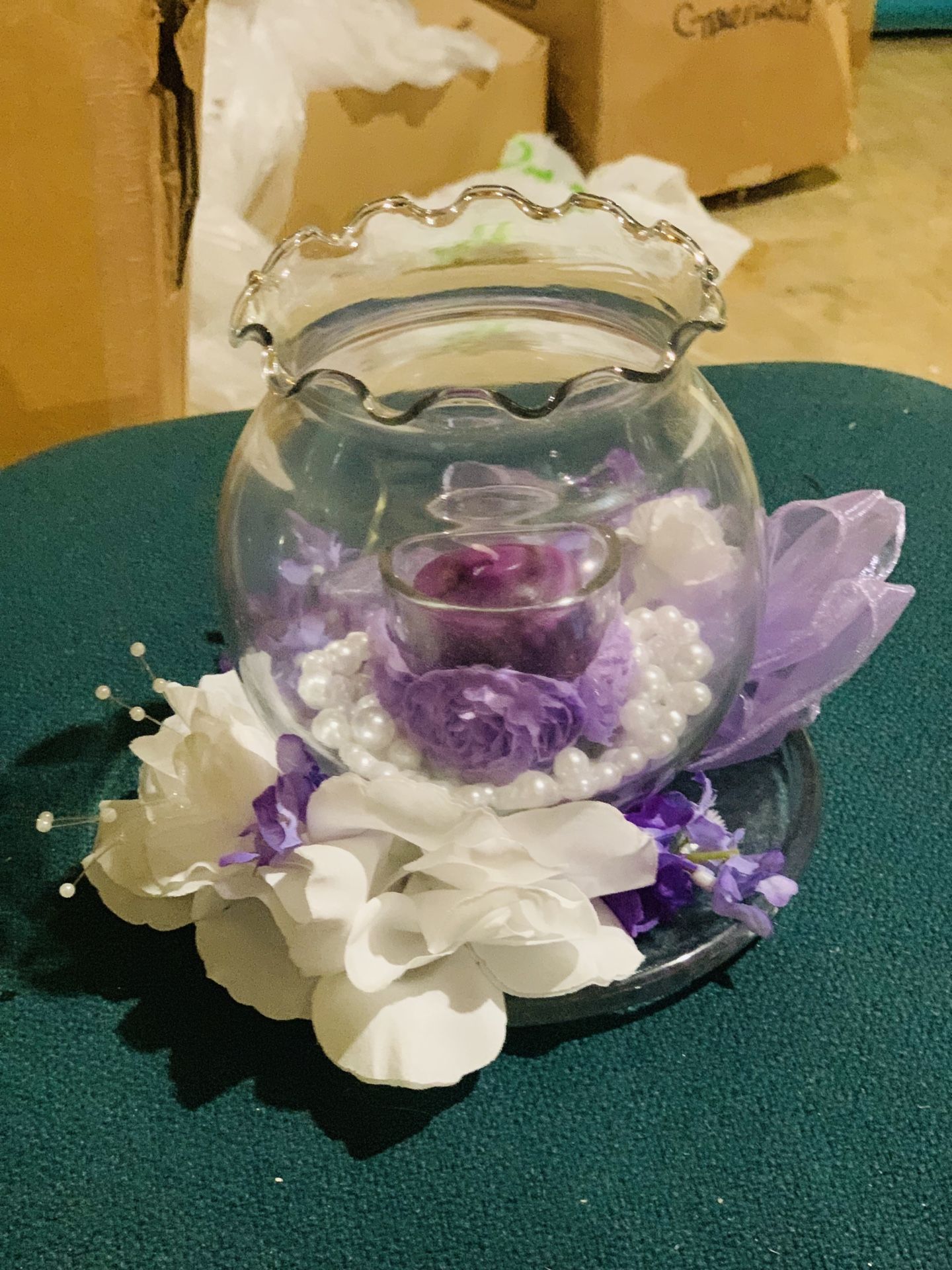 Purple and white Centerpieces and aisle chair flowers