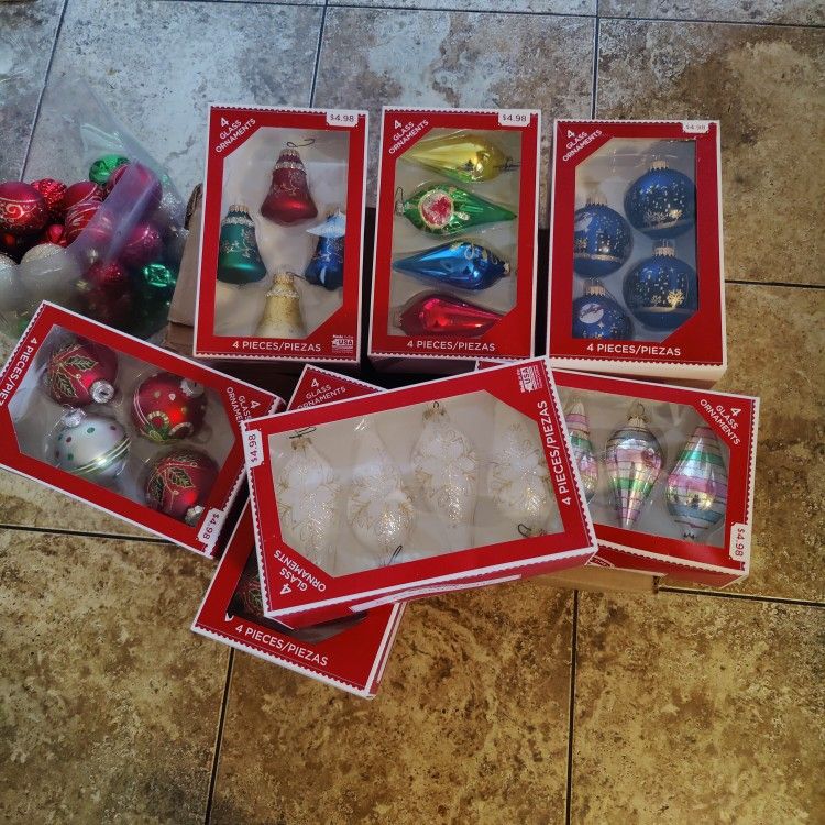 7 boxes of new ornaments, plus 40 separate ones