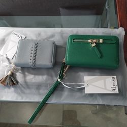 Brand New with tags 2 Wallets, 1-Green wallet /
wristlet & 1 Gray card holder. For one price!