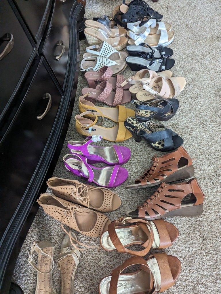 Bags Full Of Woman's Shoes And Clothing