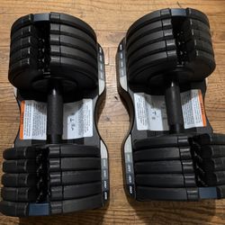50 Pounds Pair Of Adjutable Dumbells. 