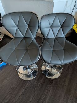 2 Adjustable Swivel Barstools