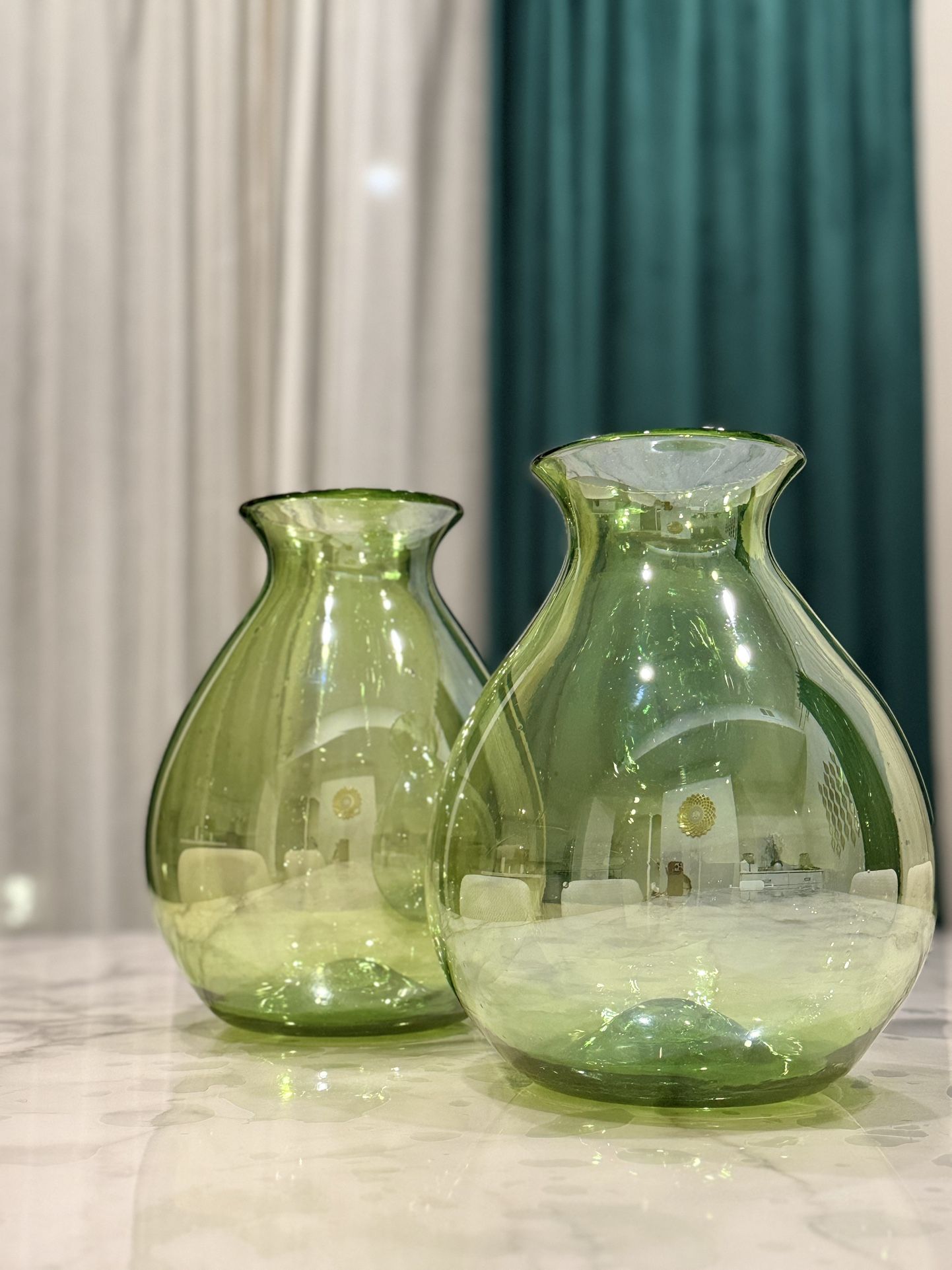 This is an Arthur Percy green glass vase produced by Gullaskruf, Sweden, c. 1950s. 