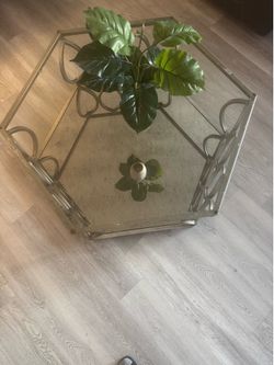 Glass center table with mirror bottom