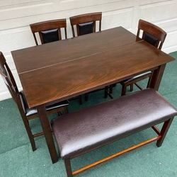 6-PC BROWN FINISH HIGH TOP DINING SET (TABLE WITH LEAF, LARGE PADDED BENCH AND 4 PADDED CHAIRS)