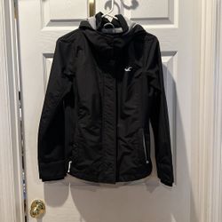 Woman’s Hollister Black All Weather Jacket With Hoodie Medium